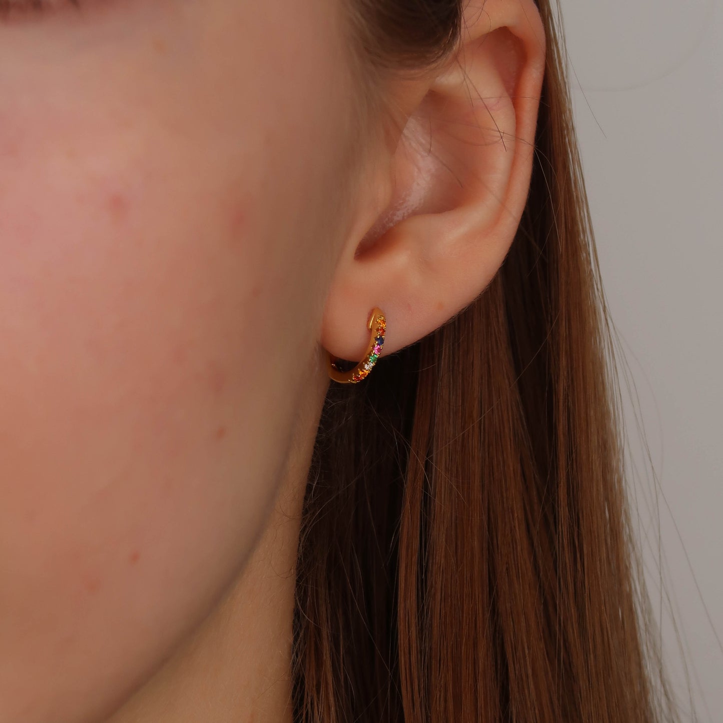 Multi Coloured Rainbow Huggies - Gold Small Hoop Earrings