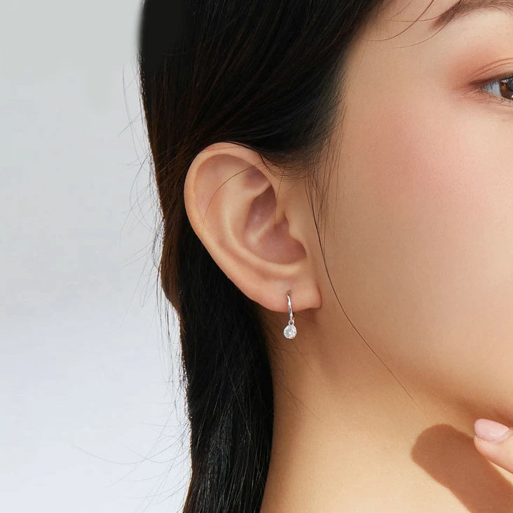 Crystal huggie earrings discount